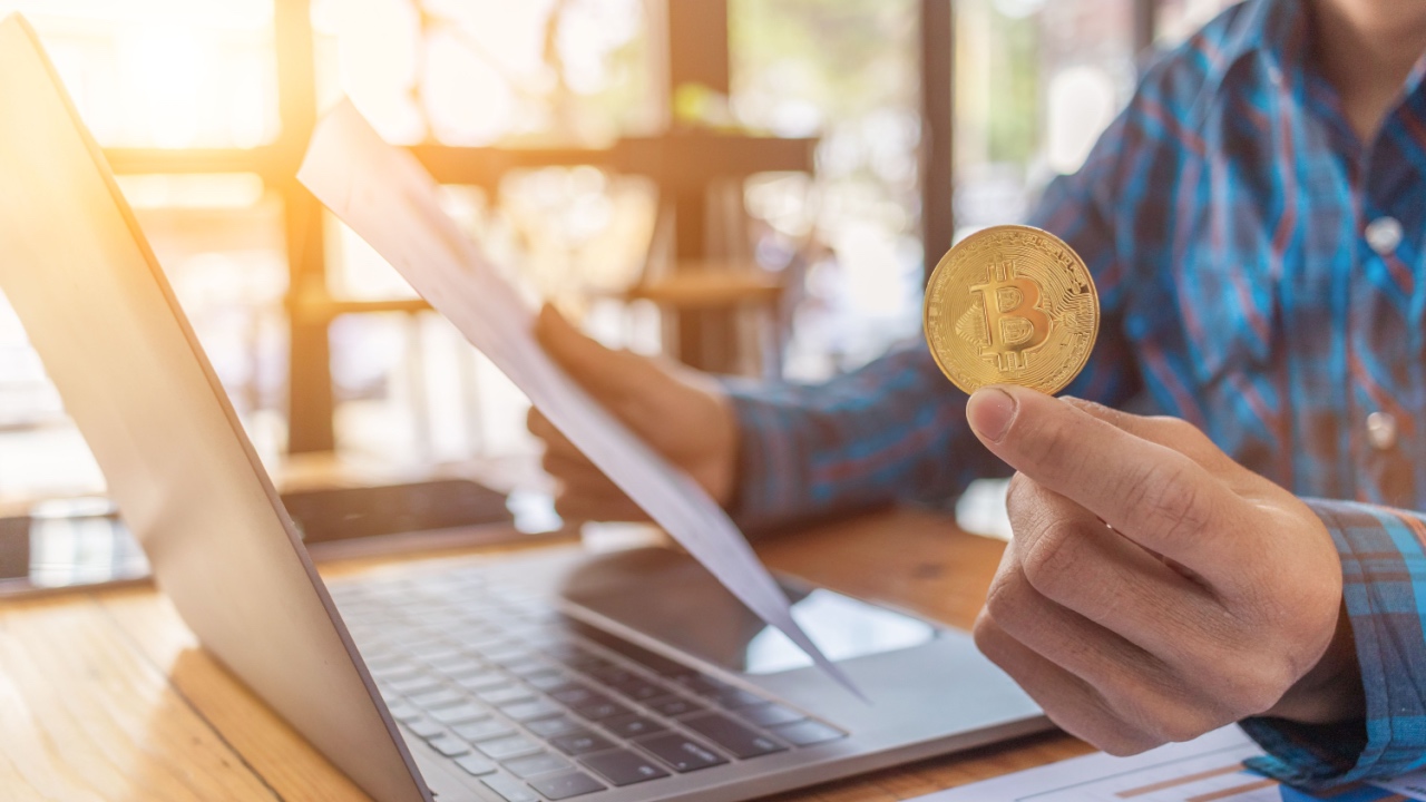 Investor holding Bitcoin