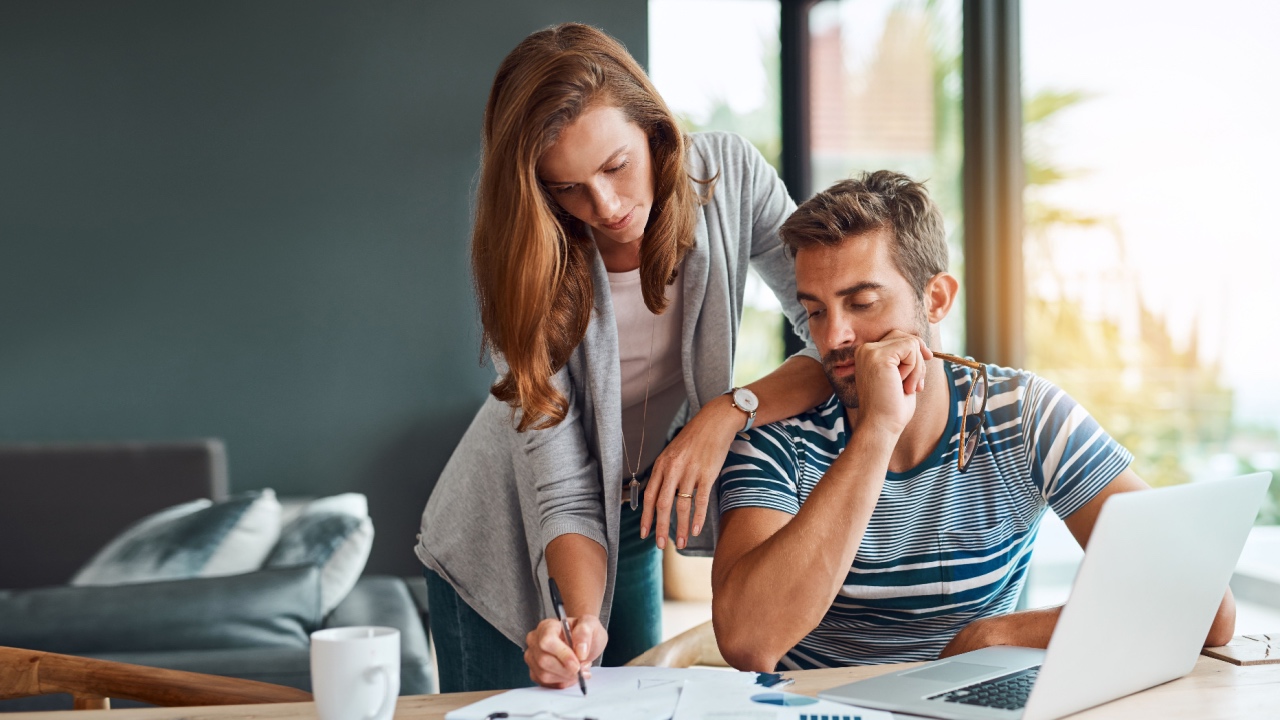 Man and Woman with tax documents