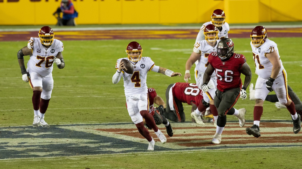 Rakeem Nuñez-Roches (#56), nose tackle with the Tampa Bay Buccaneers rushes quarterback Taylor Heinicke during a wild card playoff game against the Washington Football Team on January 9, 2021.