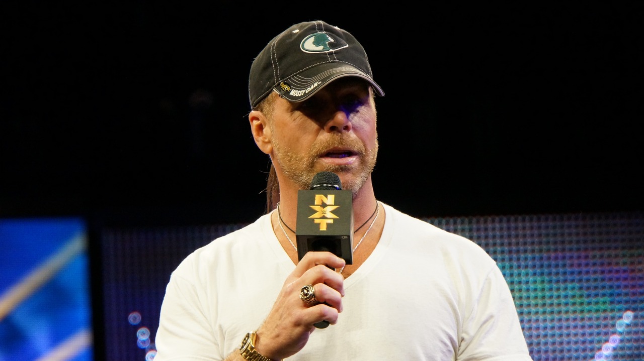 Shawn Michaels speaking at an event.
