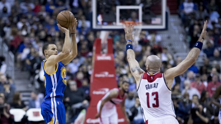 Steph Curry shooting in a game.