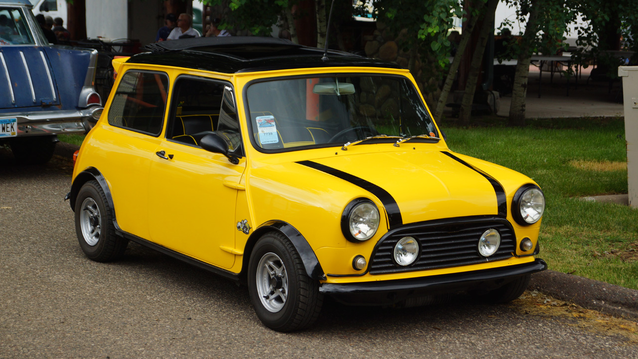 Austin Mini, front 3/4 view, modified, yellow exterior with black stripes and accents