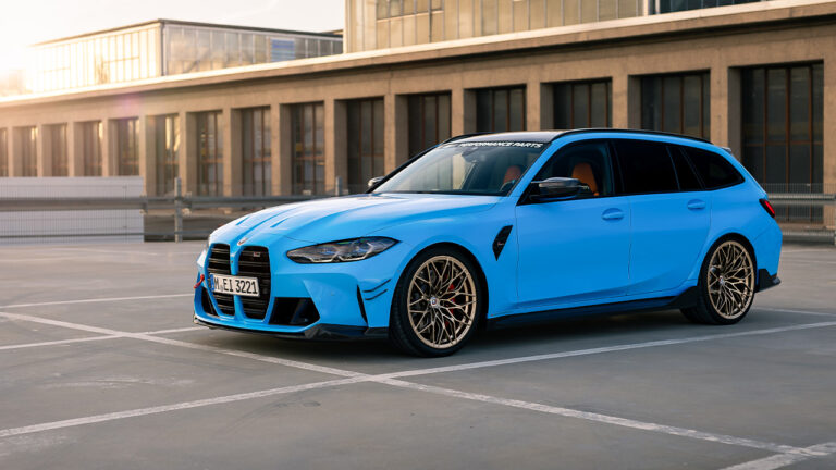 BMW M3 Touring, front 3/4 view, blue exterior, gold wheels, M Performance Parts