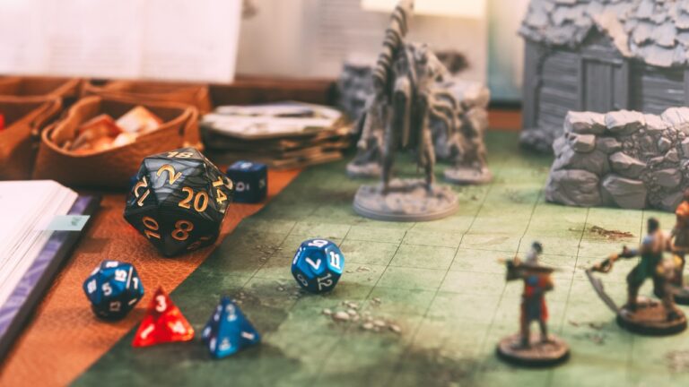Dungeons and Dragons old school tabletop group game style with role playing and board games hobby concept. Dice 20 on table create fantasy story from imagination. Foreground with blur.