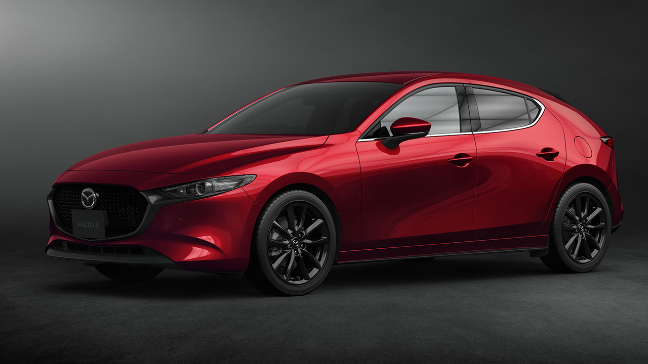 Mazda 3 Fastback, front 3/4 view, Soul Red exterior, studio shot