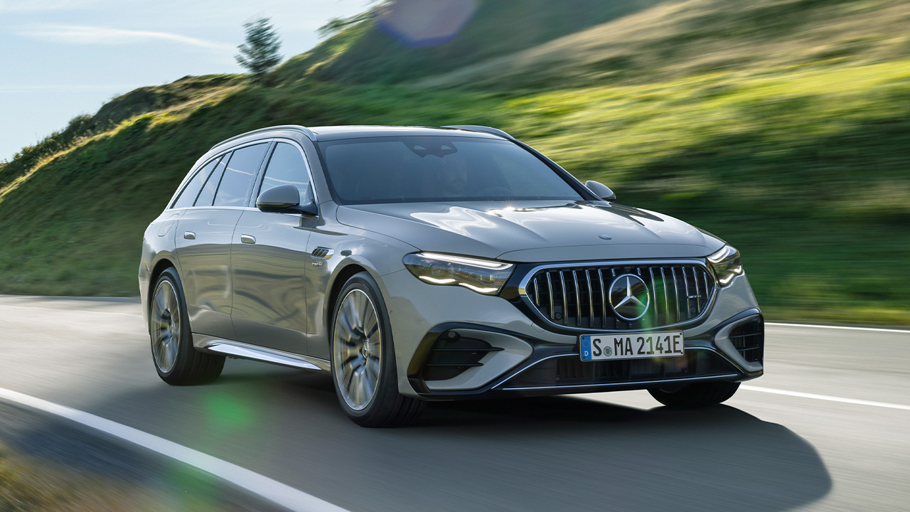 Mercedes-AMG E53 Estate, front 3/4 view, driving, gray exterior