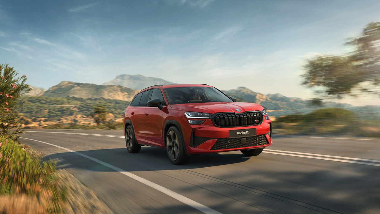 Skoda Kodiaq RS, front 3/4 view, red exterior, driving