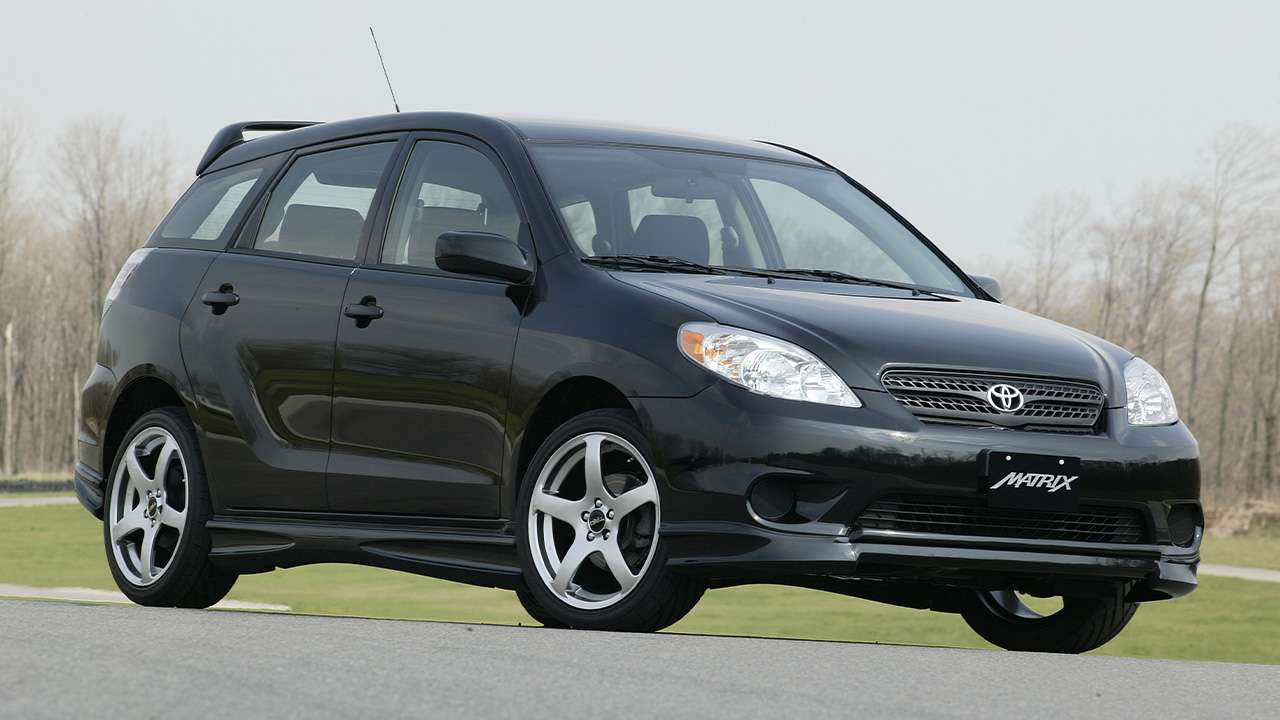 Toyota Matrix XRS, front 3/4 view, black exterior, aftermarket wheels