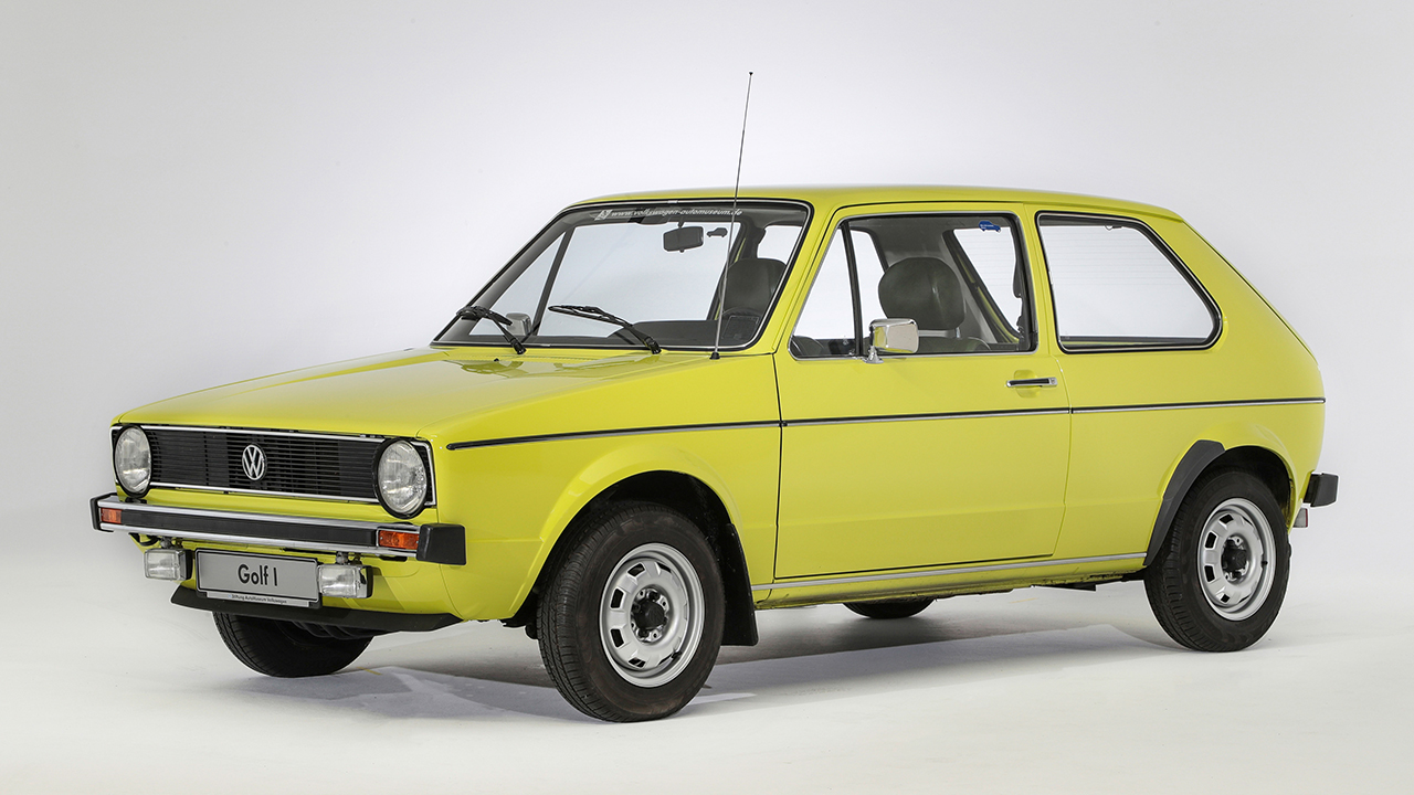 Volkswagen Golf Mk1, front 3/4 view, yellow exterior, studio shot